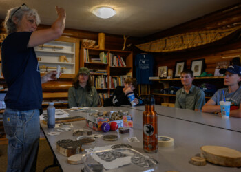 High school interns learn the basic techniques of wood engraving at The Folk School.