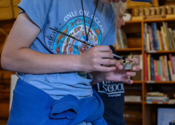 High school interns learn the basic techniques of wood engraving at The Folk School.