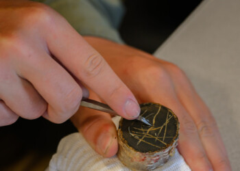 High school interns learn the basic techniques of wood engraving at The Folk School.
