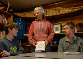 High school intern Kyle Sunderland is given feedback on his final sketch.