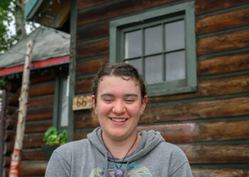 High school intern Endelyn Whitton poses in front of The Folk School.