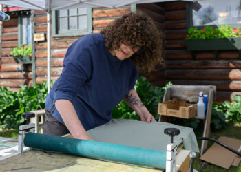 Linda Weis uses her custom prints and printmaking skillset to give ASI staff the opportunity to make their own unique shirts.